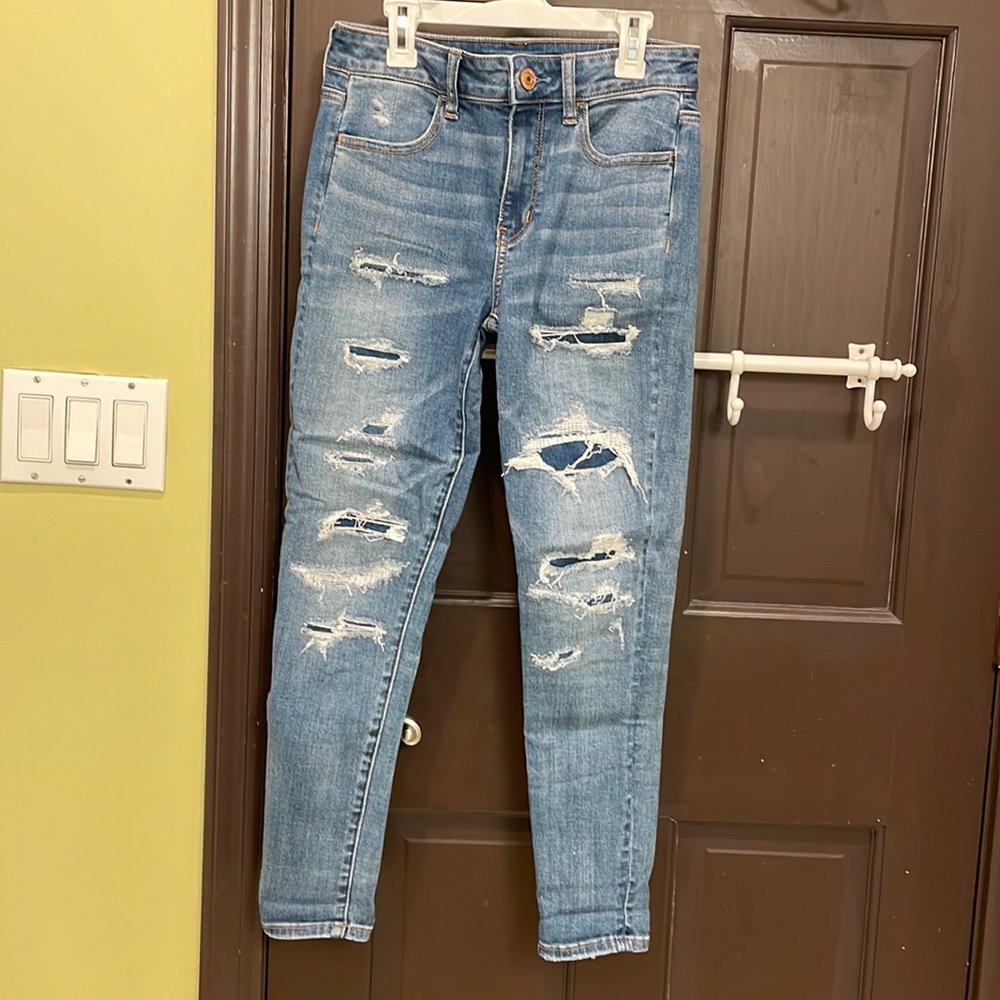 Denim wash skinny jeans with fake rips